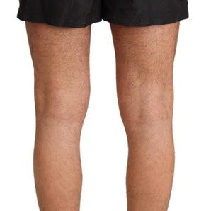 Dolce & Gabbana Elegant Black KING Motive Swim Trunks Dolce & Gabbana 