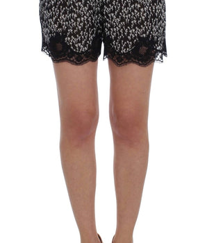 Dolce &amp; Gabbana Elegantes pantalones cortos de seda con encaje floral en blanco y negro