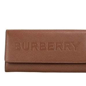 Cartera tipo clutch continental con solapa y relieve de cuero granulado tostado Porter de Burberry Marrón