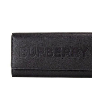 Cartera tipo clutch con solapa y logo de la marca en relieve de cuero granulado negro Porter de Burberry