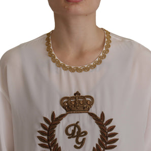 Dolce &amp; Gabbana Elegante blusa de seda con bordado de corona dorada