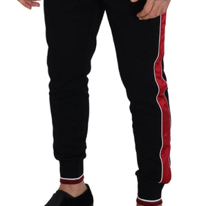 Dolce &amp; Gabbana Elegante pantalón deportivo negro con detalle rojo