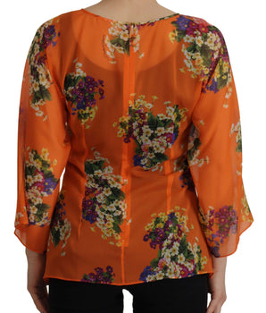 Dolce &amp; Gabbana Elegante blusa de seda floral con cremallera trasera