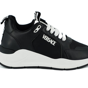 Versace Elegantes zapatillas deportivas monocromáticas de cuero