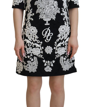 Dolce &amp; Gabbana Elegante minivestido negro evasé con ribete de encaje