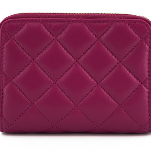 Versace elegante cartera de cuero acolchado morado