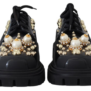 Zapatos planos Derby de cuero negro atemporales de Dolce &amp; Gabbana con detalles glamurosos