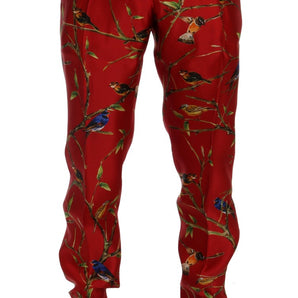 Dolce &amp; Gabbana Elegante pantalón de vestir de seda con estampado de pájaros rojos