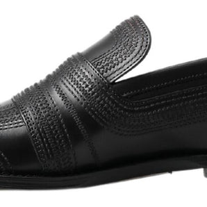 Dolce &amp; Gabbana Elegantes mocasines tipo zapatilla de cuero negro