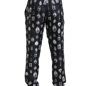 Dolce &amp; Gabbana Elegante pantalón jogger de seda con estampado religioso