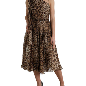 Dolce &amp; Gabbana Elegante vestido midi de leopardo con un solo hombro