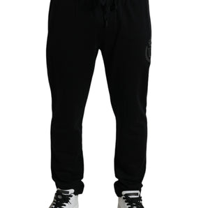 Dolce &amp; Gabbana Elegante pantalón jogger de algodón negro con logo bordado