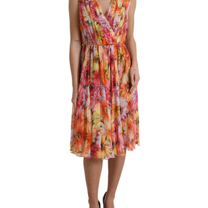 Dolce &amp; Gabbana Elegante vestido midi de seda floral con cuello en pico