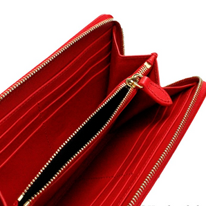 Cartera tipo clutch continental de cuero con logo en relieve rojo Elmore de Burberry