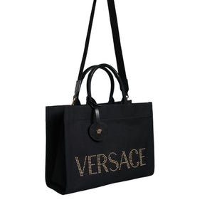 Versace Bolso tote cruzado con logo de cuero y lona con asa superior negra