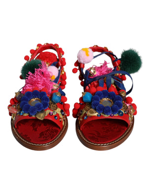 Dolce &amp; Gabbana Sandalias cruzadas de piel con pompones multicolores Zapatos