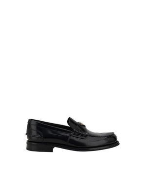 Prada Black Calf Leather Bos Taurus Slip-On Loafers