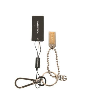 Llavero con placa del logotipo y cadena de latón plateado de Dolce &amp; Gabbana