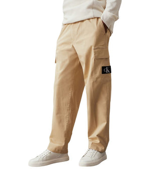 Vaqueros y pantalón de algodón beige de Calvin Klein
