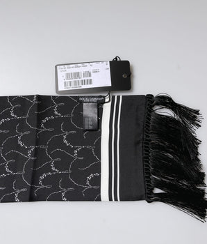 Bufanda chal negra con flecos finos y estampado de Dolce &amp; Gabbana