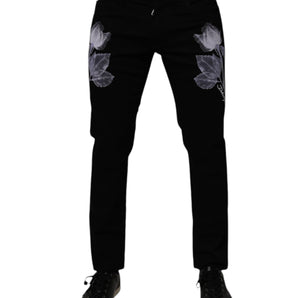 Vaqueros ajustados de algodón con estampado floral negro de Dolce &amp; Gabbana para hombre
