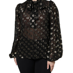 Blusa negra transparente con lunares y cuello anudado de Dolce &amp; Gabbana
