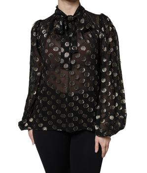 Blusa negra transparente con lunares y cuello anudado de Dolce &amp; Gabbana