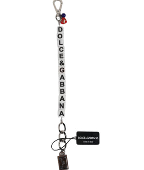 Pulsera Dolce &amp; Gabbana con dije de dados y cadena de latón plateado adornada con el logotipo