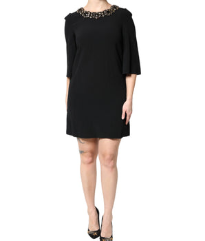 Vestido mini de cuello redondo con cristales negros de Dolce &amp; Gabbana