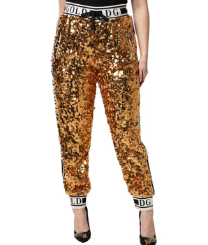 Pantalones deportivos con lentejuelas y logo DG en dorado metalizado de Dolce &amp; Gabbana