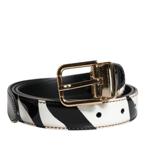 Cinturón con hebilla de metal dorado y logo de cebra en blanco y negro de Dolce &amp; Gabbana
