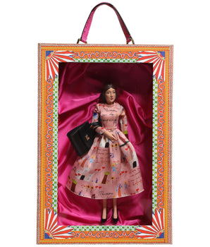 Muñecas sicilianas de cuero y cerámica de porcelana con vestido rosa de Dolce &amp; Gabbana