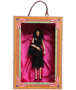 Muñecas sicilianas de cuero y cerámica de Dolce &amp; Gabbana con vestido negro