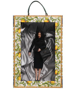 Muñecas sicilianas de cuero y cerámica de Dolce &amp; Gabbana con vestido negro