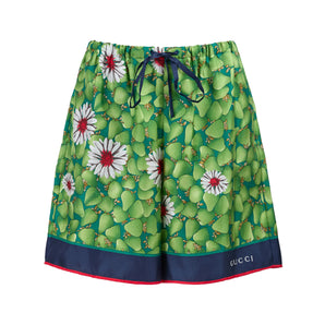 Pantalones cortos de seda con estampado de flores verdes de Gucci