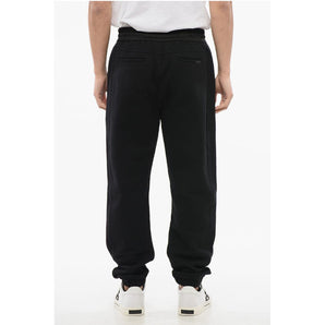 Saint Laurent Cuffed Fleeced Cotton Sweatpants with Nylon Detail