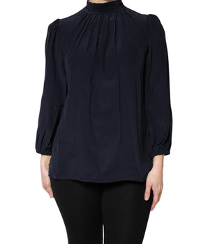 Blusa de manga larga con cuello alto y seda azul de Dolce &amp; Gabbana