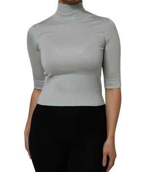 Top de cuello alto de seda verde claro con mangas 3/4 de Dolce &amp; Gabbana