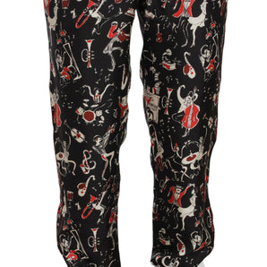 Dolce &amp; Gabbana Elegante pantalón lounge de seda negro con estampado rojo