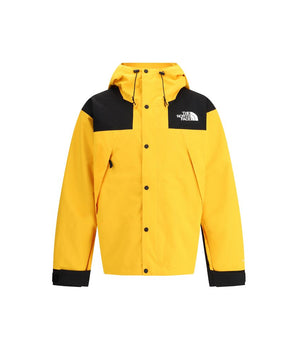 The North Face yellow polyamide shell jacket