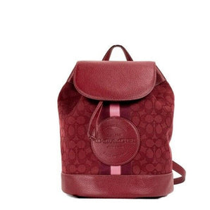 COACH Mochila Dempsey con parche del logo y lona jacquard exclusiva de Apple en rojo