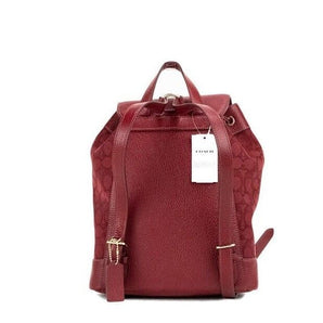 COACH Mochila Dempsey con parche del logo y lona jacquard exclusiva de Apple en rojo